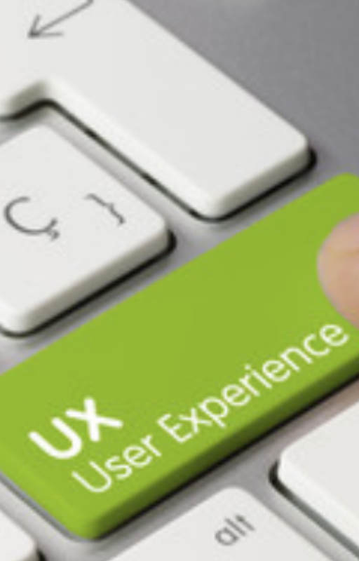 One of the keys of a keyboard in focus reading User Experience UX