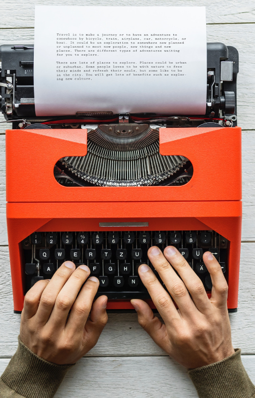 photo of typewriter with a paper fixed in it