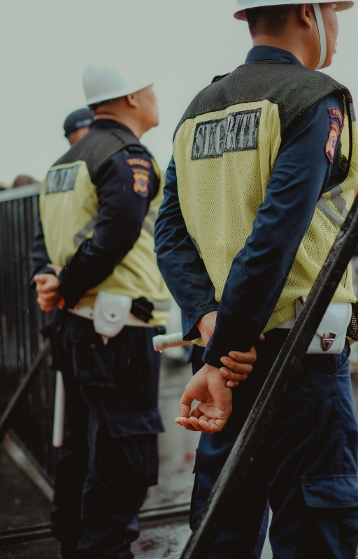 two security guards standing