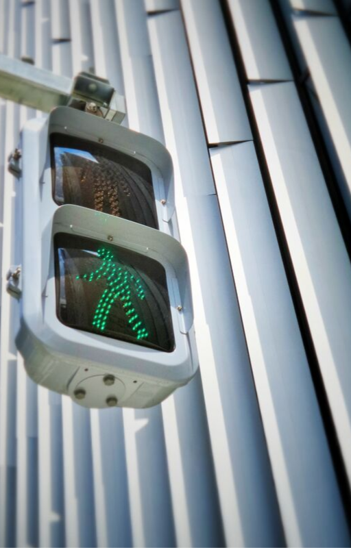 illustration image showing green traffic light and white building in behind