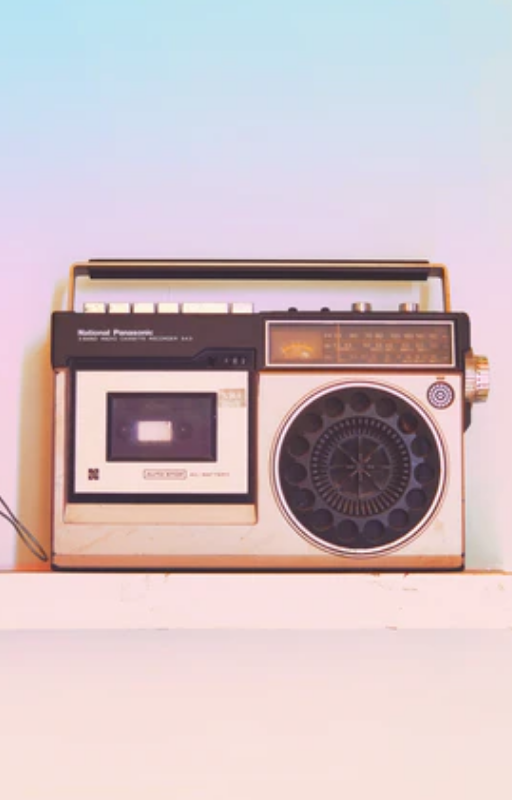 Brown and black radio on white table