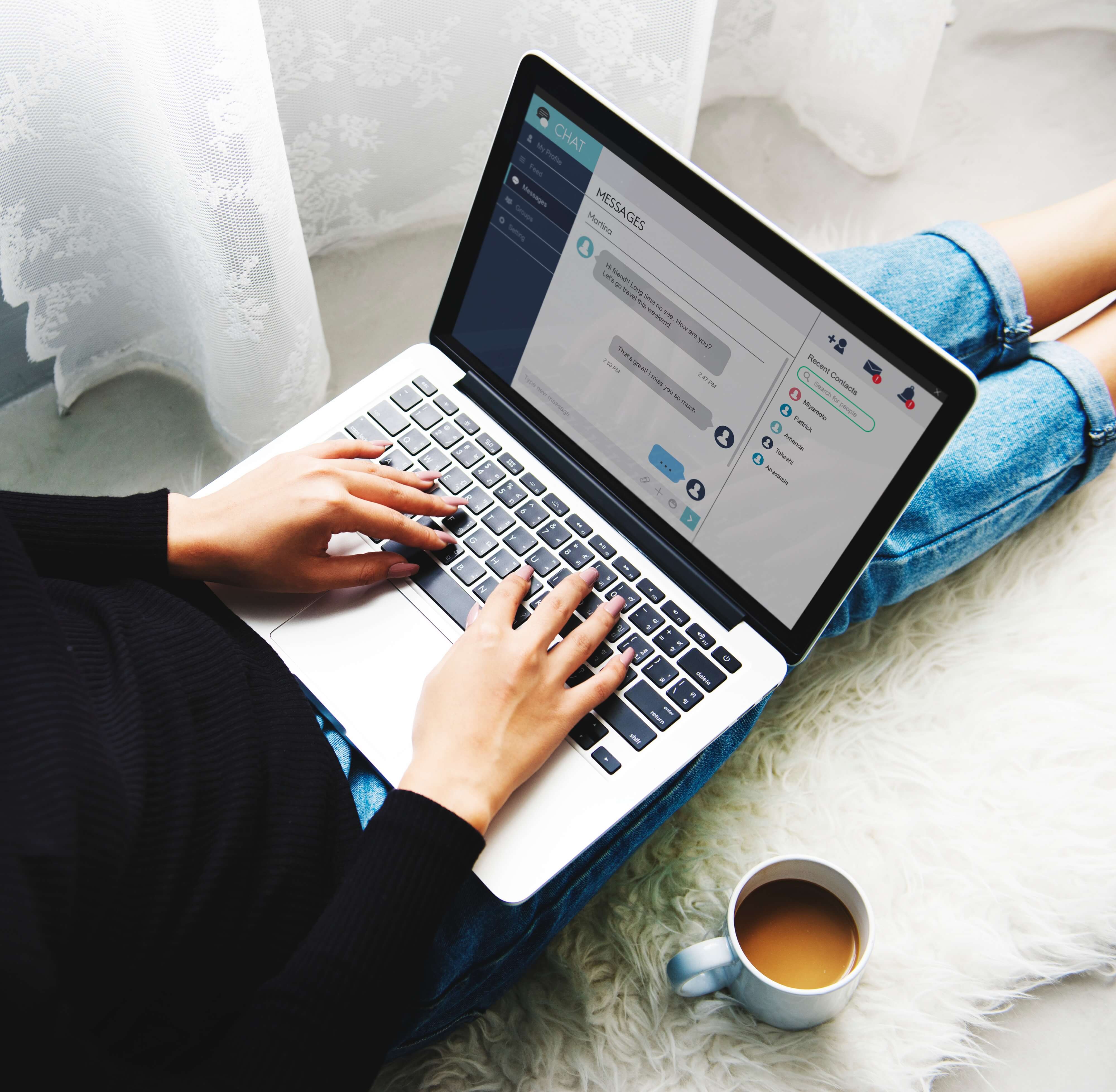 person typing on laptop computer