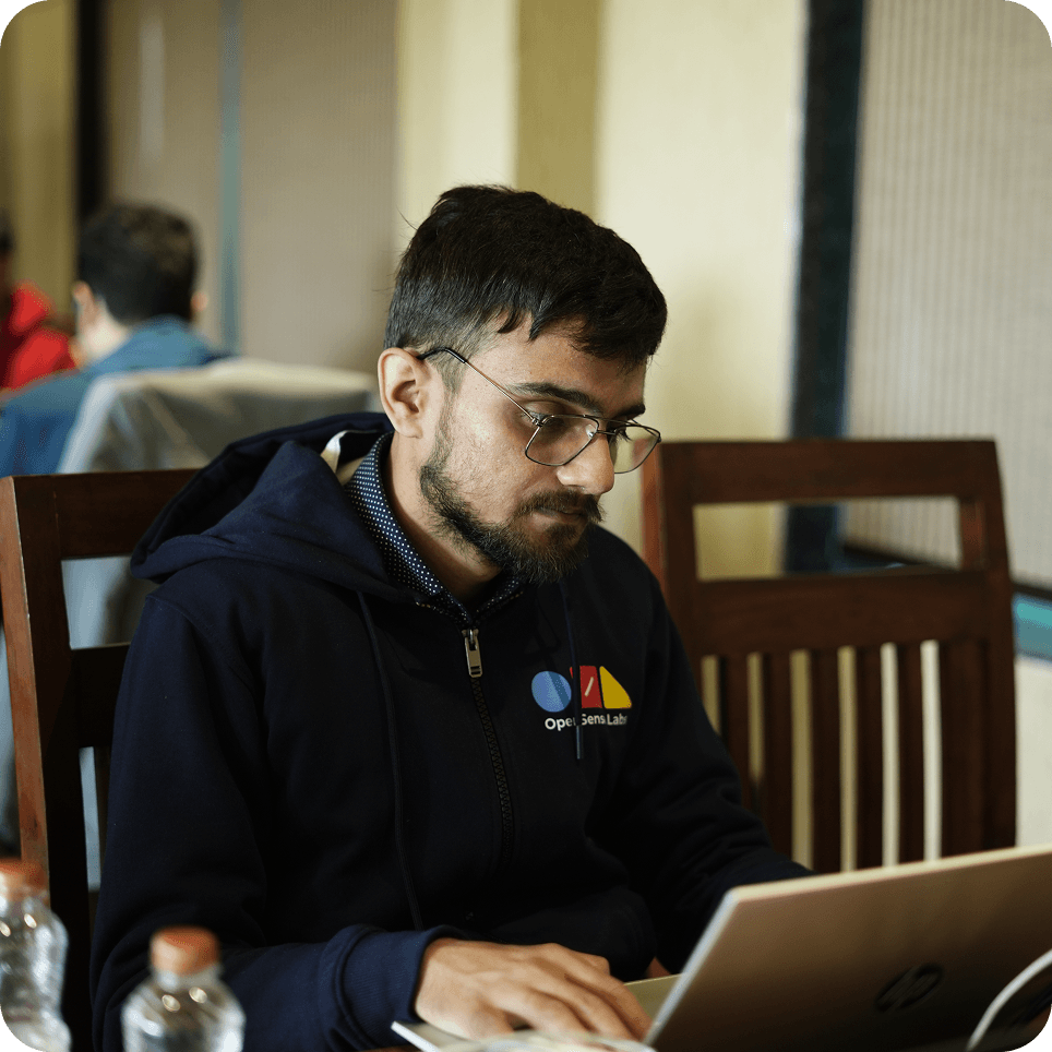 Team working in a blue room