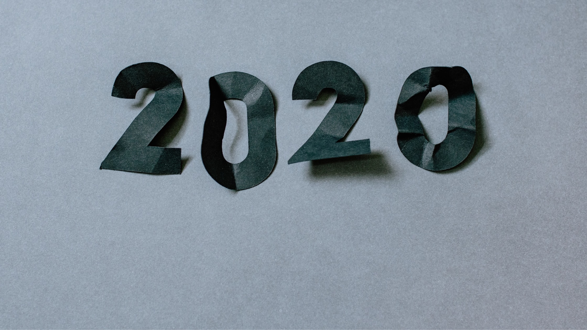 2020 written against grey background