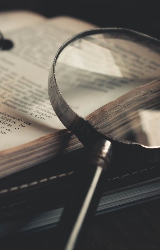 magnifying glass kept on a book