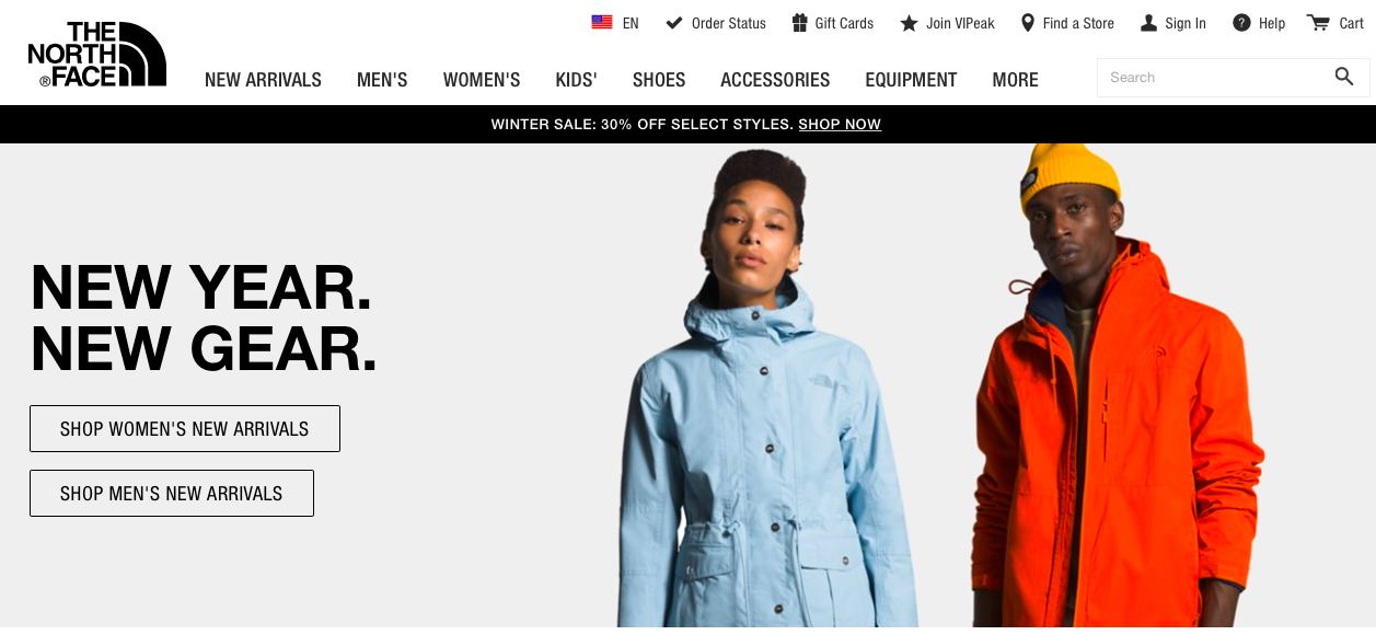 e-commerce site homepage with a couple standing and facing camera