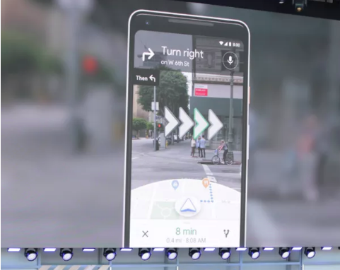 A smartphone showing Google Map's augmented reality feature