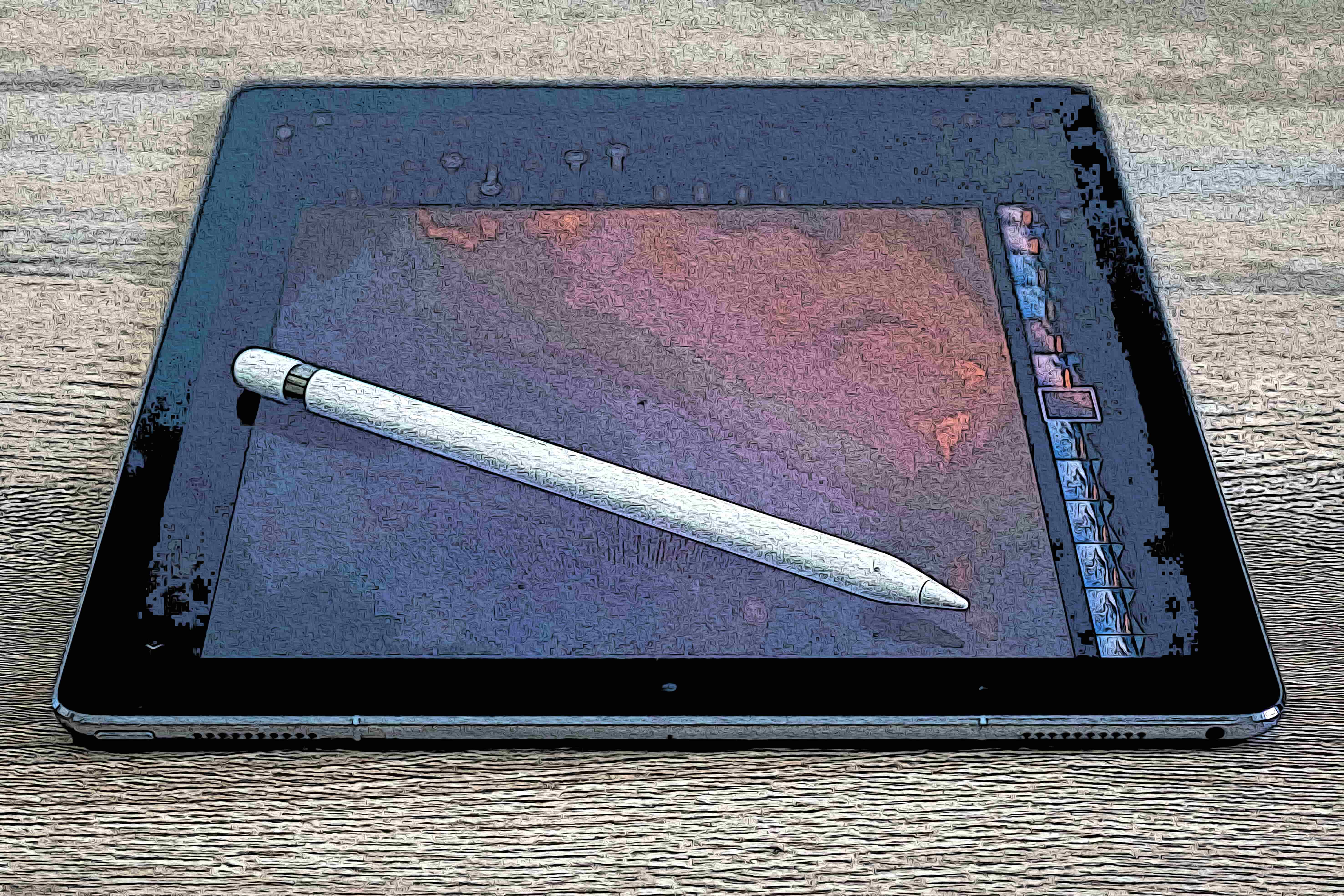 a white stylus pen on a tab
