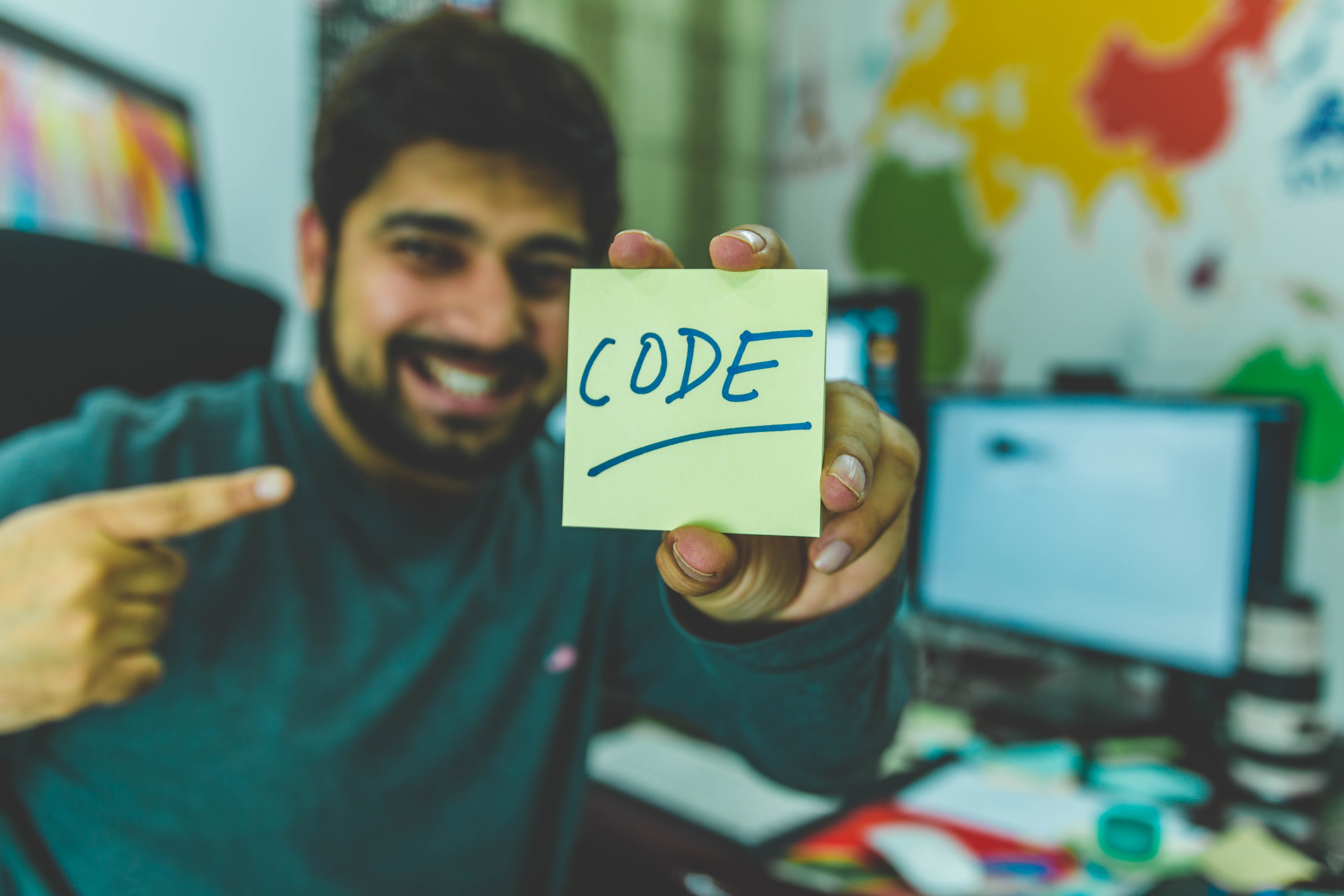 illustration image showing a blurred boy having a yellow sticker with code written in it
