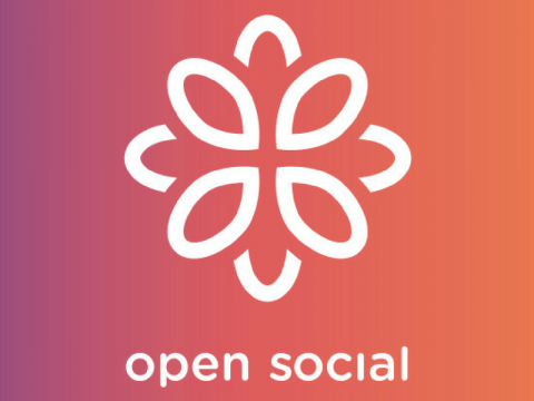 Image of a white flower in an orange and purple background where open social is written at the bottom of it