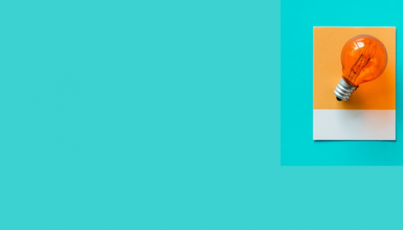 sea green blog banner with orange bulb on right