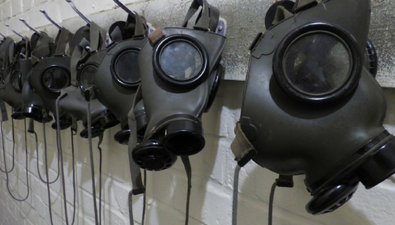 blog banner with gas masks lined up 