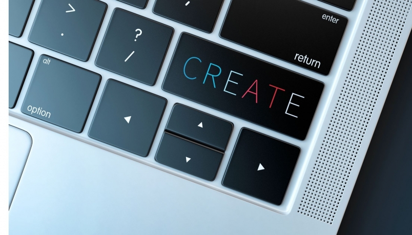 Keyboard with one bigger key reading 'create'