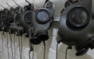 blog banner with gas masks lined up 