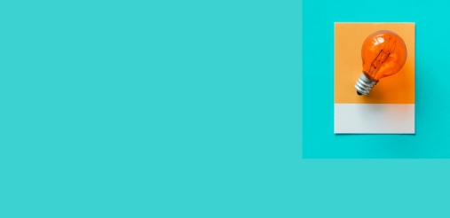 sea green blog banner with orange bulb on right