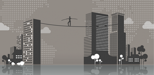 Man walking on a rope between two buildings