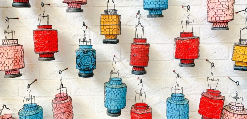 different coloured lamp lights hanging on wall