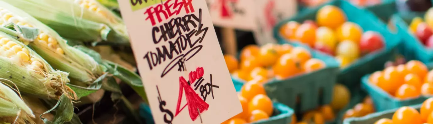 cherry tomatoes with a board