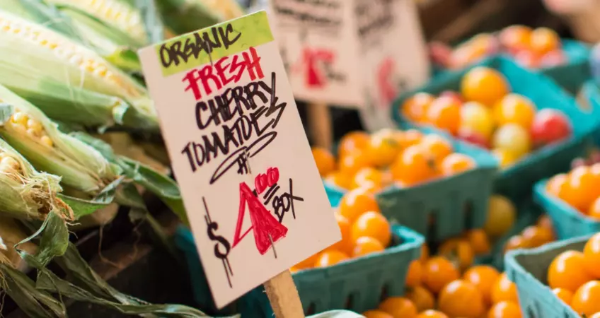   cherry tomatoes with a board
